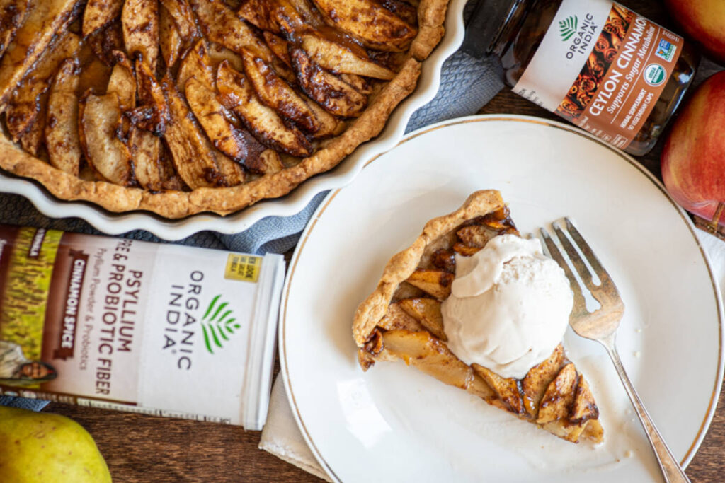 Apple pear tart with ceylon cinnamon and psyllium on white plate with ice cream