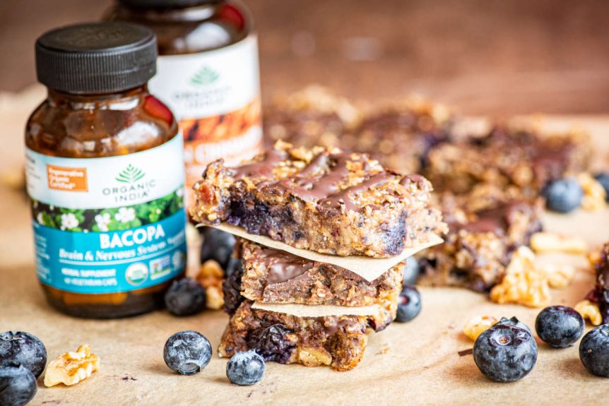 Bacopa bars with blueberries on parchment paper