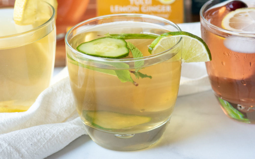 Moringa detox iced tea in a glass with lime and mint as garnish