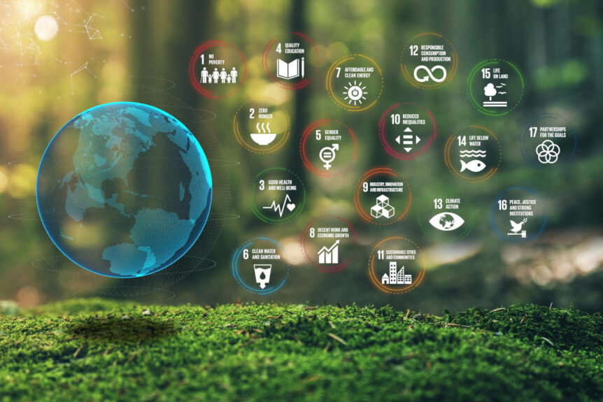 SDGs icons with planet earth, green grass and trees.