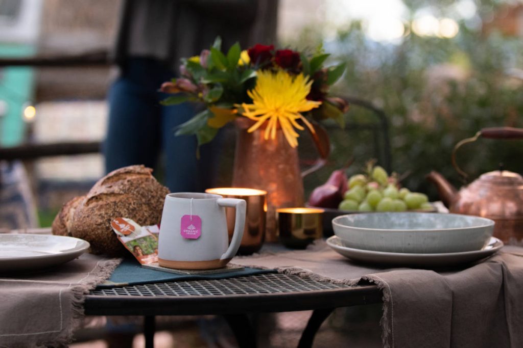 Tea pairings at an autumn outdoor tea party with bread and fruit 