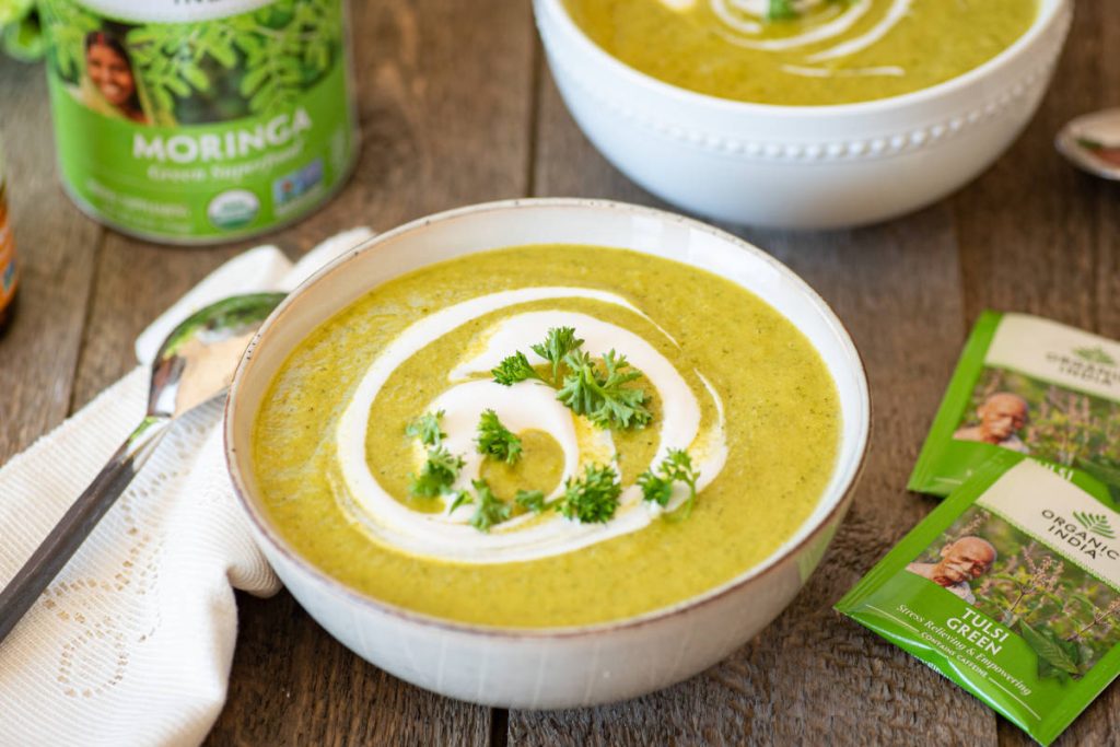 Green tea pairings broccoli soup in white ceramic bowl. 