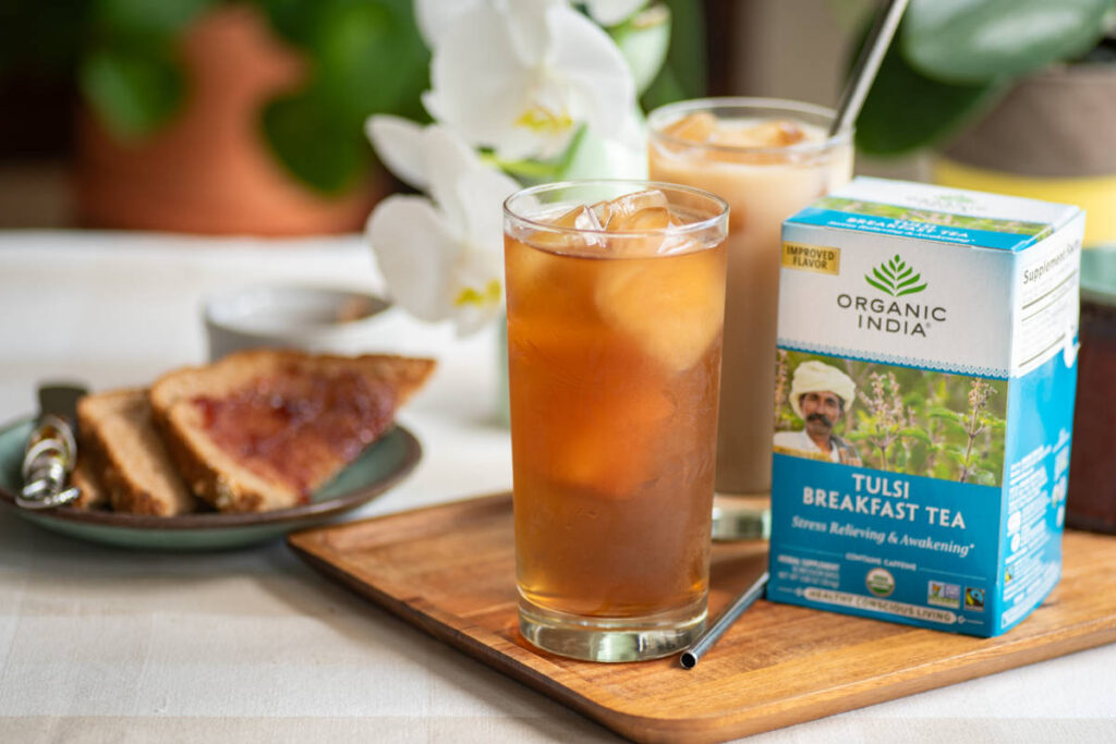 Tulsi breakfast tea, which contains assam black tea prepared iced in a glass. 