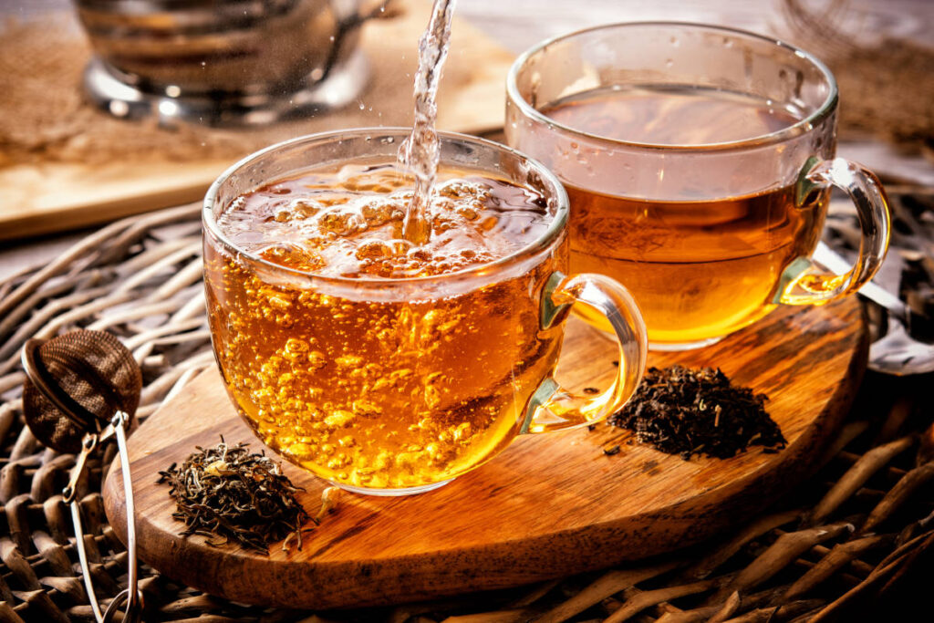 Darjeeling tea in clear tea mugs 